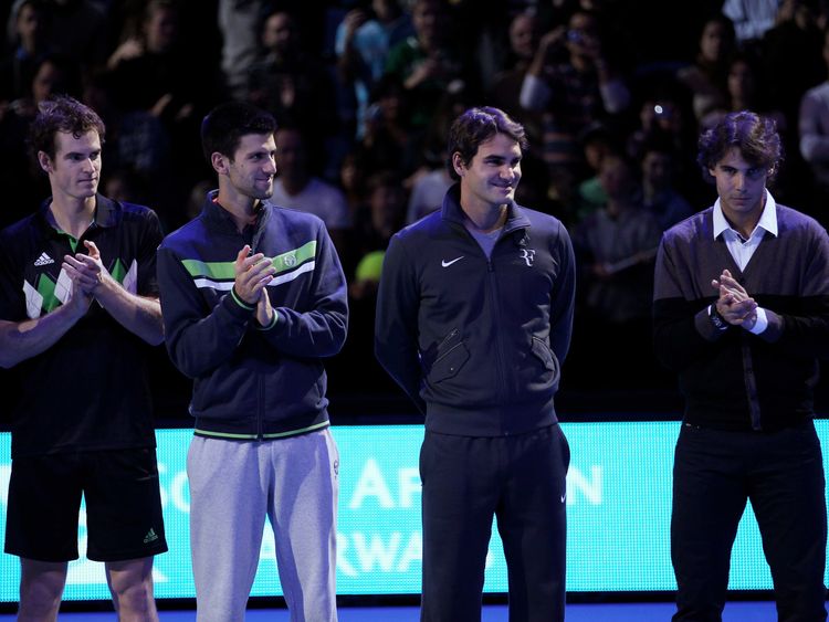 Andy Murray of Great Britain, Novak Djokovic of Siberia, Roger Federer of Switzerland and Rafael Nadal of Spain attend a ceremony for Carlos Moya's retirement during the Barclays ATP World Tour Finals at O2 Arena on November 21, 2010 in London, England