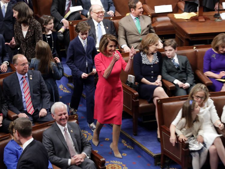 Speaker-designate Rep. Nancy Pelosi (D-CA) gives a double thumbs up on her way into the chamber