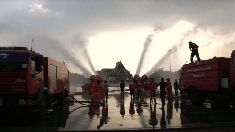 The government is using water cannons to try to dissipate the dust