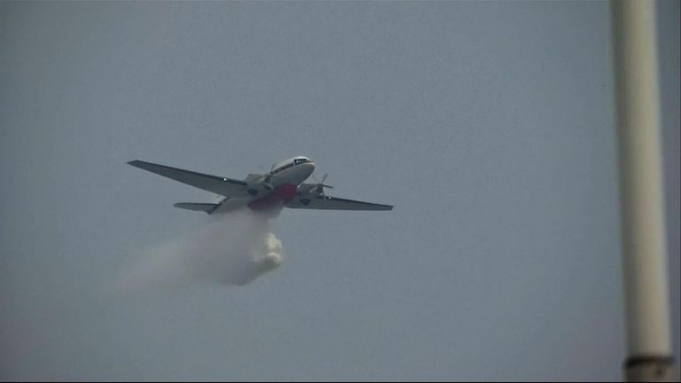 Planes are being used to distribute chemicals which will trigger rain to clear the pollution