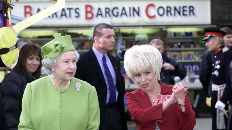 Queen Elizabeth II and Barbara Windsor during visit to Elstree Studios where EastEnders was filmed, in 2001
