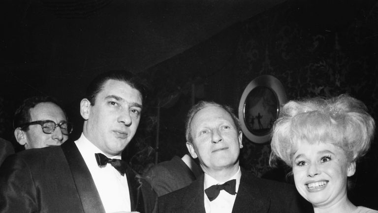 Actress Barbara Windsor with notorious East End gangster Ronnie Kray (left), London, circa 1960