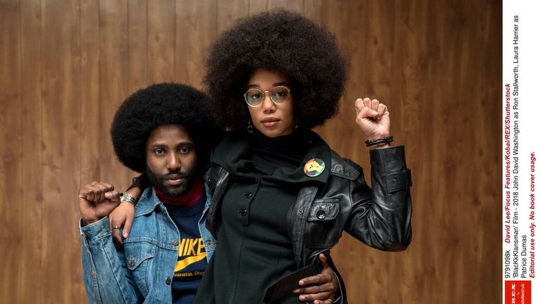 John David Washington as Ron Stallworth and Laura Harrier as Patrice Dumas in BlacKkKlansman