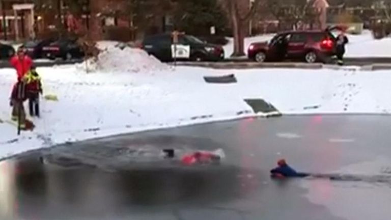11-year-old boy is rescued from centre of icy pond in Illinois