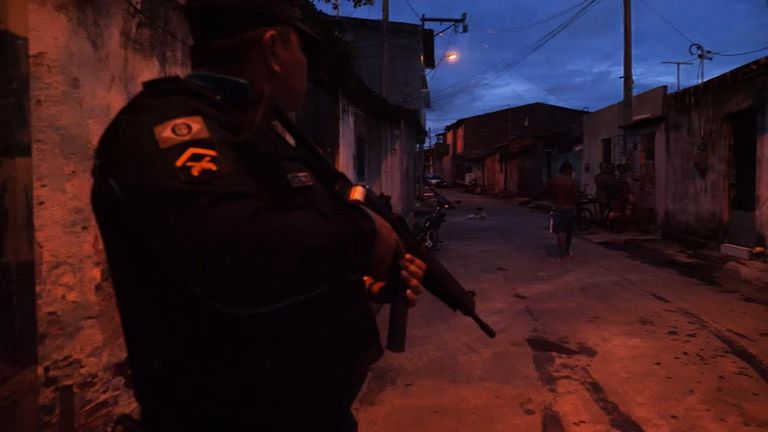 An armed policeman patrolling in Fortaleza