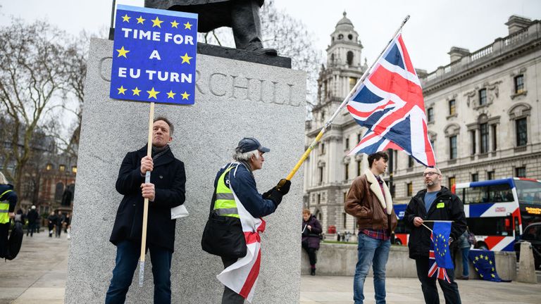 A pro-Remain and pro-Leave campaigner outside the House of Commons