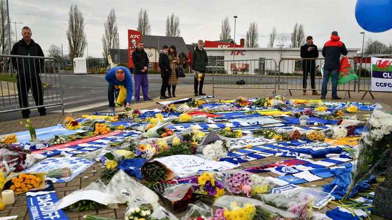 Flowers laid outside the stadium in Cardiff