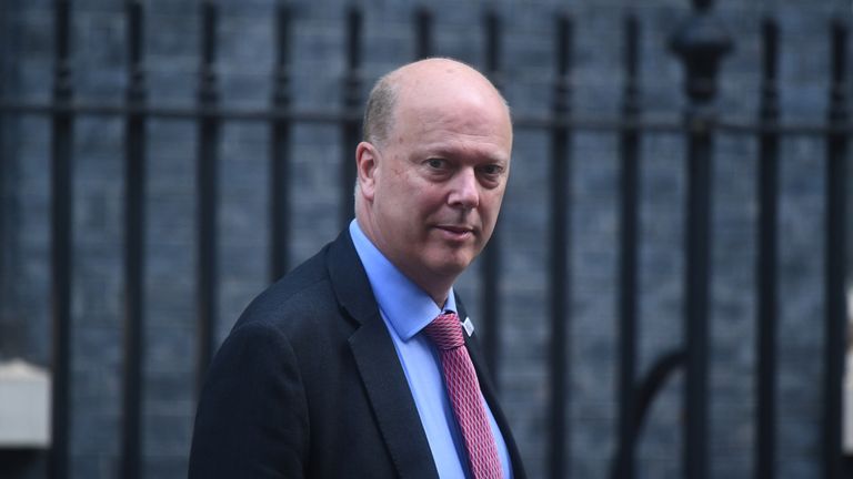 Transport Secretary Chris Grayling leaves Downing Street, London.