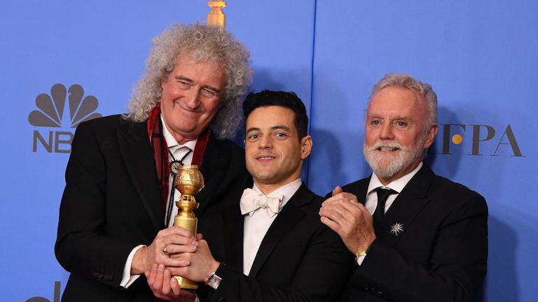 Golden Globes 2019: Queen&#39;s Brian May and Roger Taylor with Rami Malek, who plays Freddie Mercury in Bohemian Rhapsody