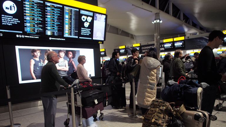Passengers in Terminal 2 at Heathrow airport after departures were temporarily suspended