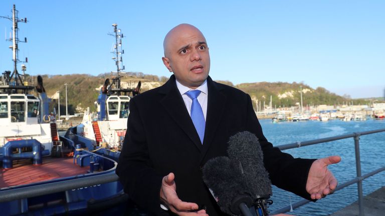 Britain&#39;s Home Secretary Sajid Javid speaks to members of the media after meeting with UK Border Force staff on the quayside at Dover, in south-east England on January 2, 2019