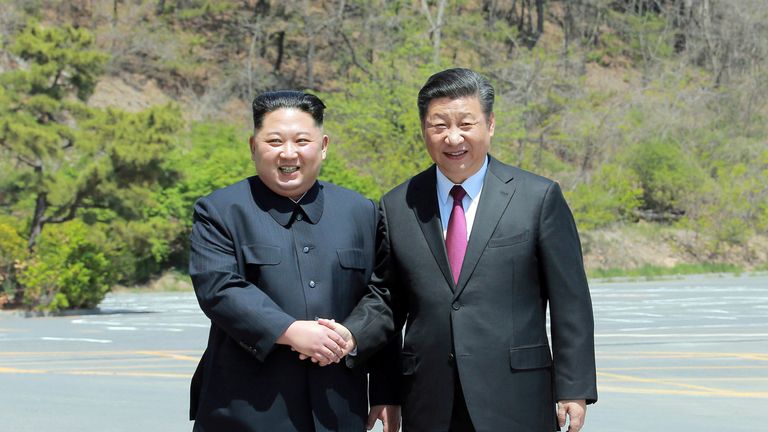 North Korean leader Kim Jong Un shakes hands with China&#39;s President Xi Jinping, in Dalian, China in this undated photo released on May 9, 2018