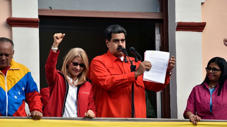 Maduro with his wife Cilia Flores, vice president Delcy Rodriguez and Diosdado Cabello address supporters