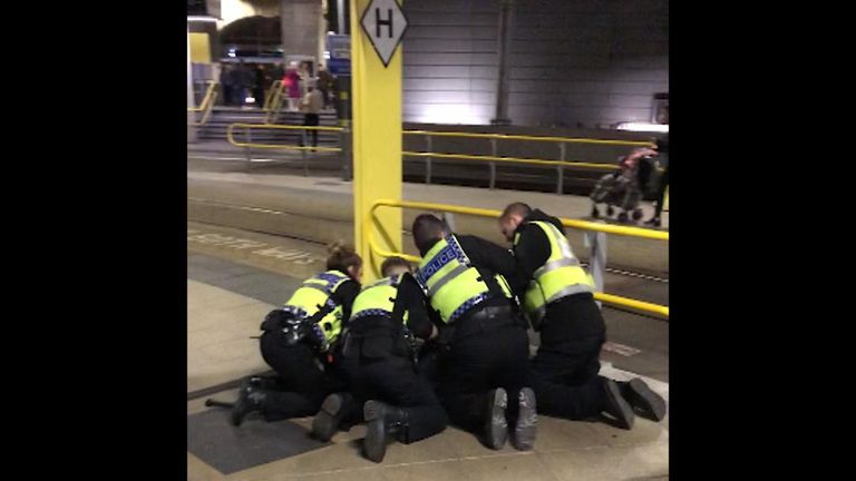 Officers arrest a suspect at Manchester Victoria Station. Pic @Clack_Sam