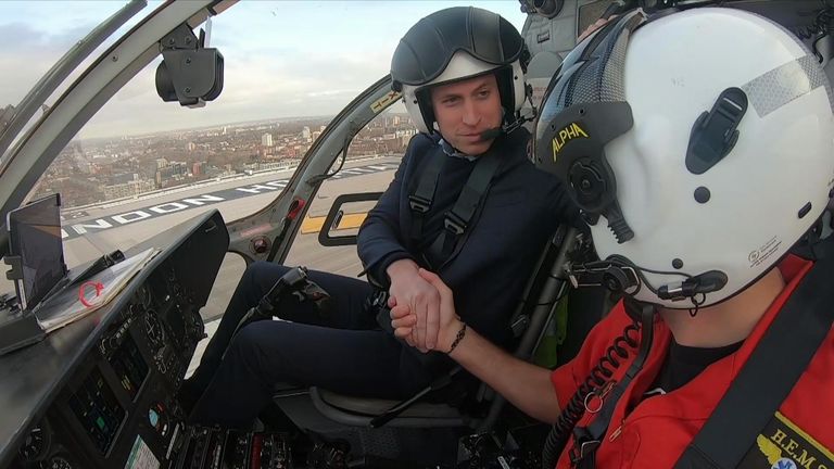Prince William after landing a helicopter at the Royal London Hospital