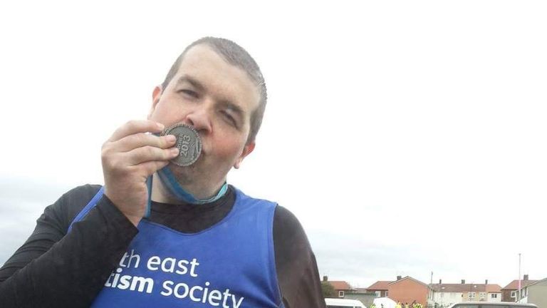 Shaun Hughes kisses his medal after completing the Great North Run in 2013. Pic: Shaun Hughes