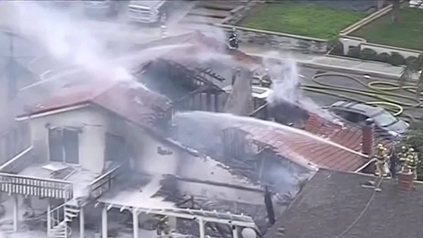House bursts into flames after being hit by broken plane parts | US ...