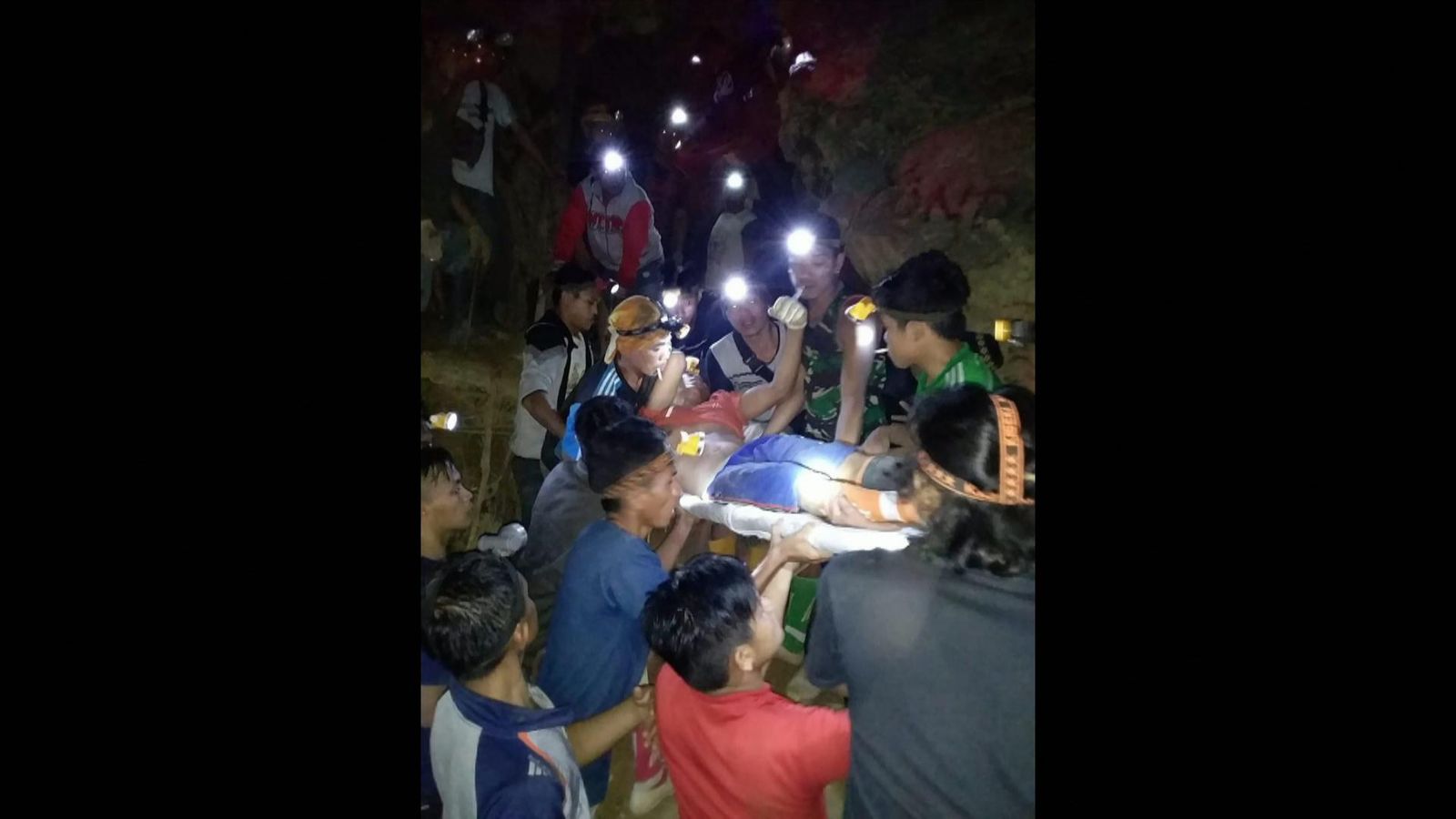 At least three dead and dozens buried alive in Indonesia gold mine collapse