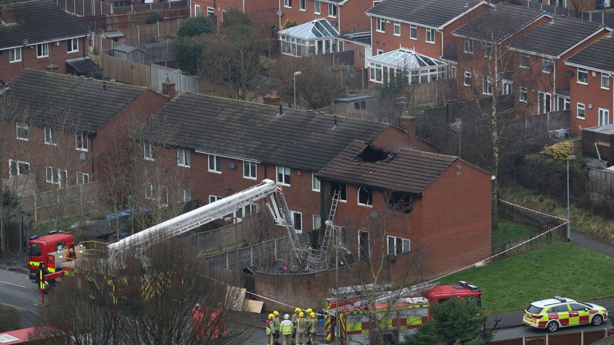 Two questioned over house fire that killed four children in ...