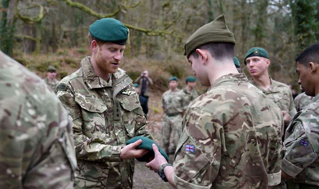 Prince Harry presents Royal Marines with green berets Prince Harry presents Royal Marines with green berets