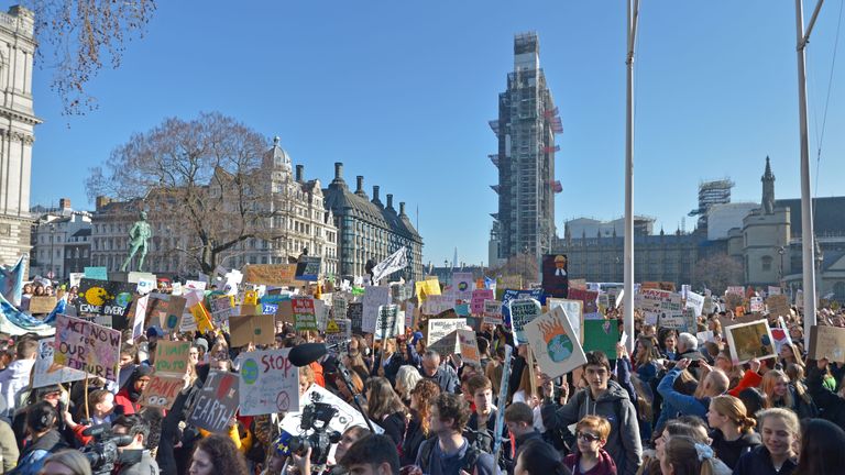 Students from the Youth Strike 4 Climate movement during a climate change protest on Parliament Square in Westminster
