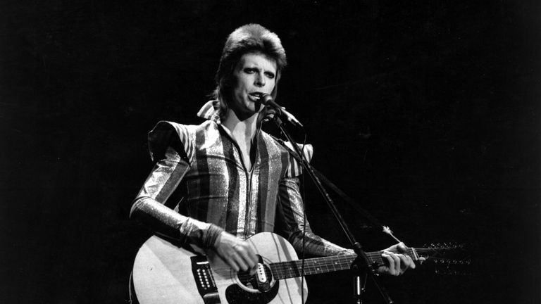 Ziggy Plays Guitar
3rd July 1973: David Bowie performs his final concert as Ziggy Stardust at the Hammersmith Odeon, London. The concert later became known as the Retirement Gig. (Photo by Express/Express/Getty Images)