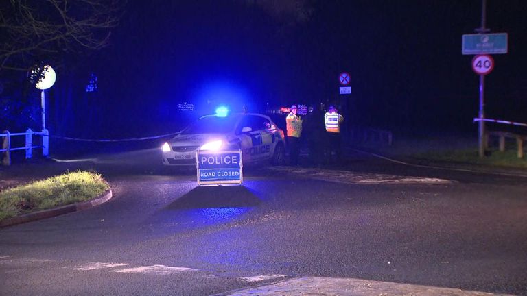Police officers at the scene in Surrey 