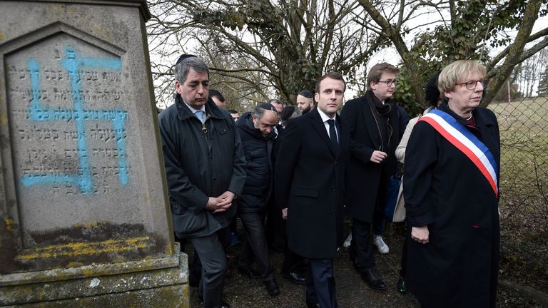 Emmanuel Macron made a sombre visit to the cemetery in Quatzenheim near Strasbourg