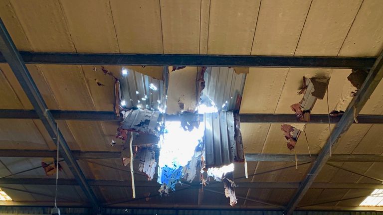 A hole in the roof of the silo shows the state of the store which could feed Yemen&#39;s people