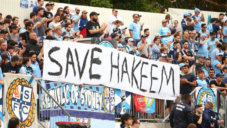 Sydney FC fans display a sign in support for Hakeem al Araibi