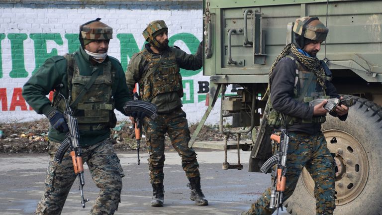 Soldiers near the site of the gun battle in southern Pulwama
