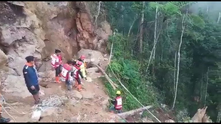 Rescue workers are using hand tools because of the fear of another landslide Pic: National Agency for Disaster Countermeasure 