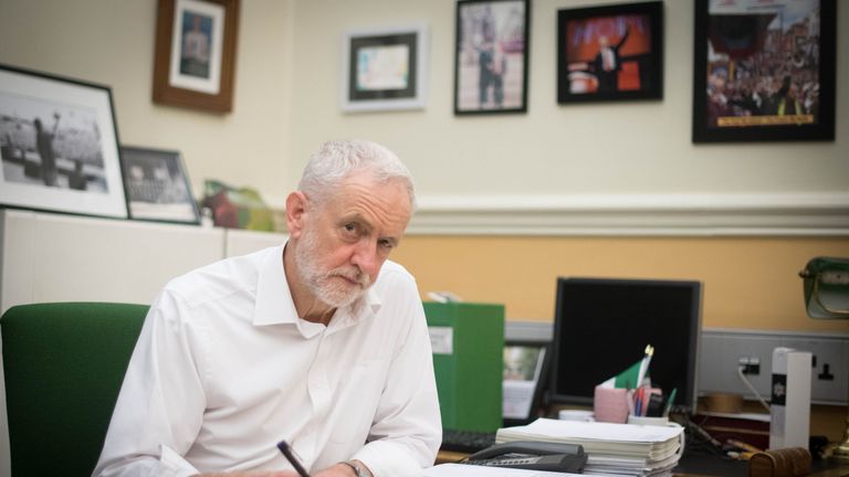 Labour leader Jeremy Corbyn signs a letter he has written to Prime Minister Theresa May laying out Labour&#39;s five Brexit demands before she goes to Brussels 