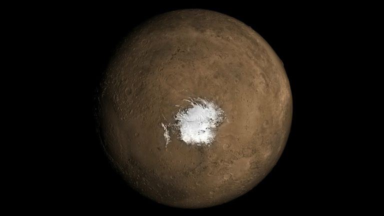 The Martian South Pole. A new study in Geophysical Research Letters argues there needs to be an underground source of heat for liquid water to exist underneath the polar ice cap. Credit: NASA.