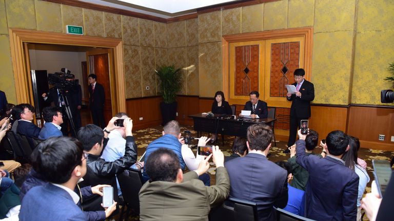 North Korean Foreign Minister Ri Yong Ho (centre) gives a rare briefing to journalists in Hanoi