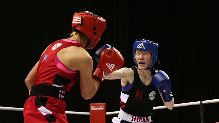 Rachael MacKenzie, in blue, overcame her eating disorder through sport