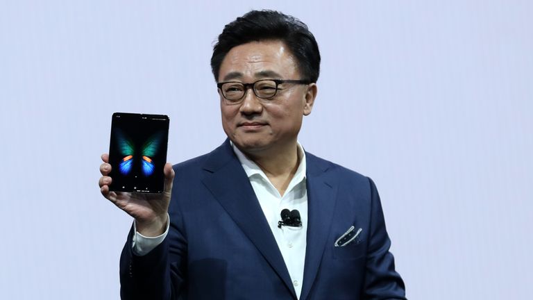 DJ Koh, the CEO of Samsung&#39;s mobile division, holds the  Samsung Galaxy Fold smartphone