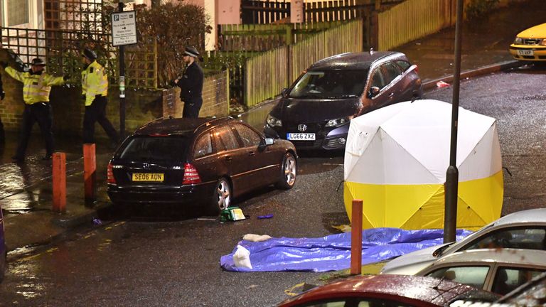 A police forensic tent at the scene of the stabbing