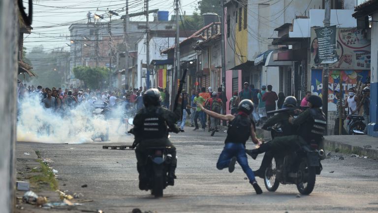 Venezuelan national guards clash with demonstrators in Urena