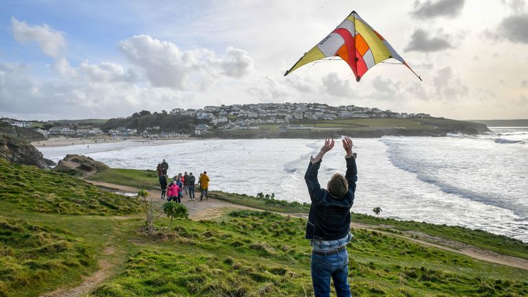 A man took advantage of the sunny weekend weather to fly a kite in New Polzeath, Cornwall