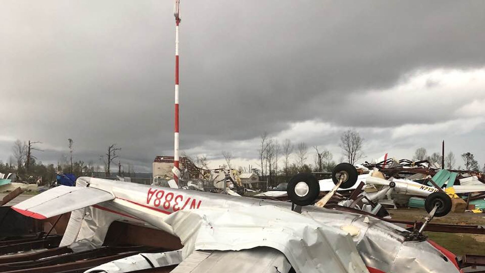 At least 23 dead as tornado swarm hits Alabama, Florida and