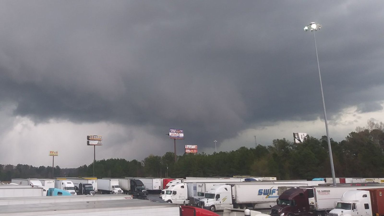 At least 23 dead as tornado swarm hits Alabama, Florida and