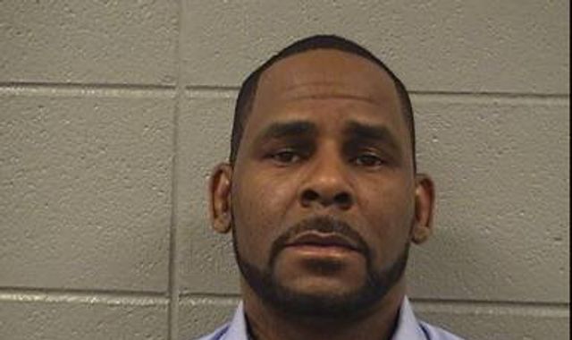 R Kelly refused bail as prosecutor says singer is 'still a danger to young girls'