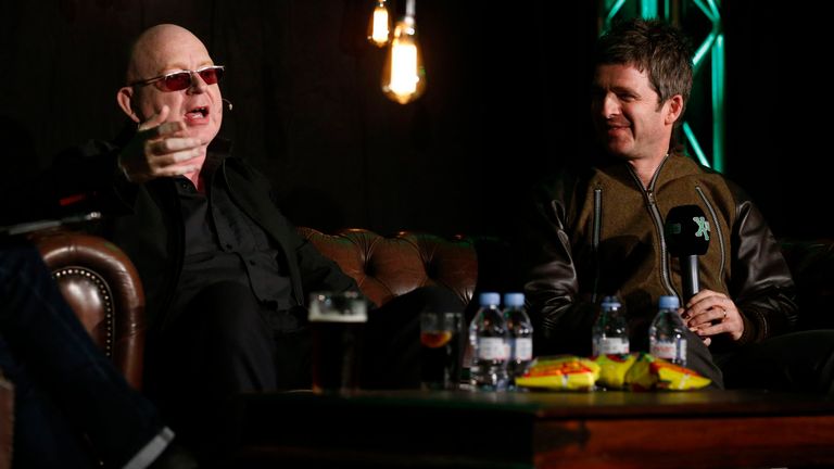 Noel Gallagher (right) speaks to Alan McGee during XFM Presents An Evening in Conversation with Noel Gallagher at Hammersmith Social Club, London, in aid of new national charity, Global's Make Some Noise, in 2014