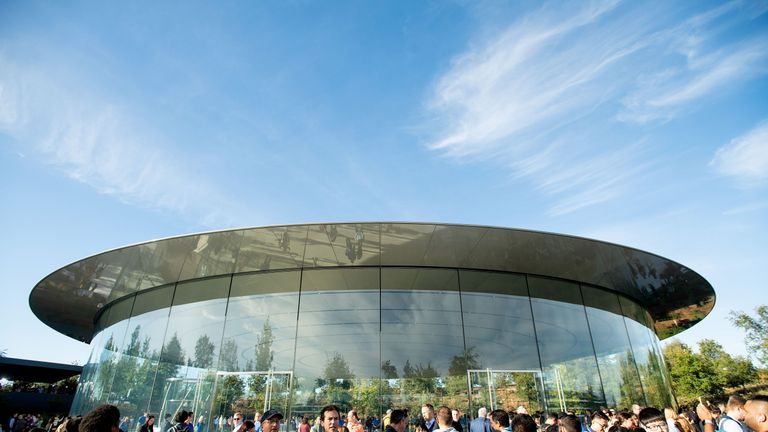 Attendees gather for a product launch event at Apple's Steve Jobs Theater on September 12, 2018, in Cupertino, California. - New iPhones set to be unveiled Wednesday offer Apple a chance for fresh momentum in a sputtering smartphone market as the California tech giant moves into new products and services to diversify.Apple was expected to introduce three new iPhone models at its media event at its Cupertino campus, notably seeking to strengthen its position in the premium smartphone market a yea