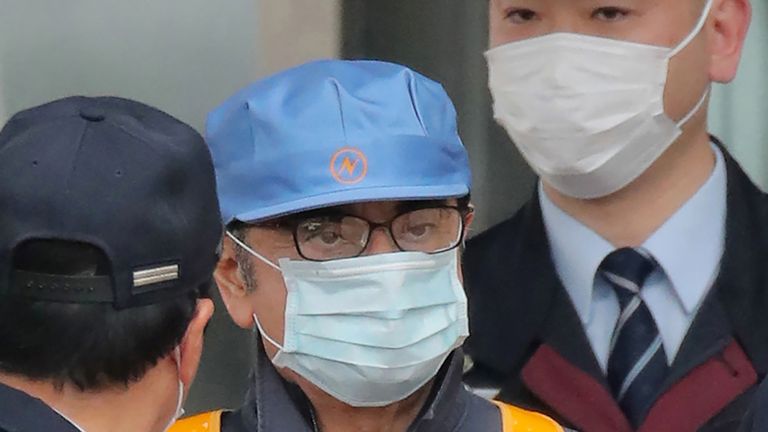 Former Nissan chairman Carlos Ghosn leaves the Tokyo Detention House following his release on bail in Tokyo on March 6, 2019