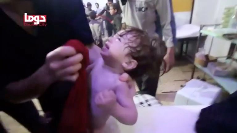 April 2018: A child cries as they have their face wiped following an  alleged chemical weapons attack