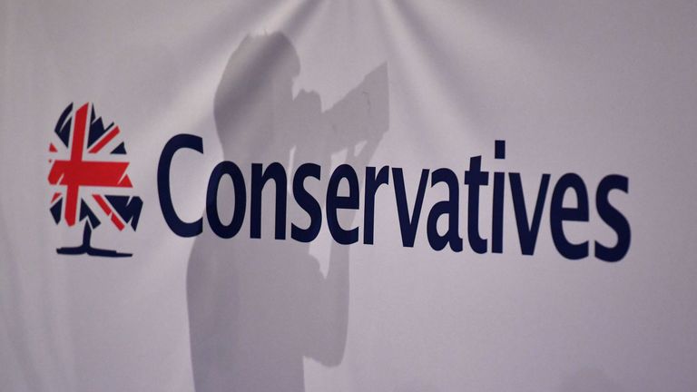 The background of a 'Conservatives' banner in the main hall on the first day of the Conservative Party Conference 2018