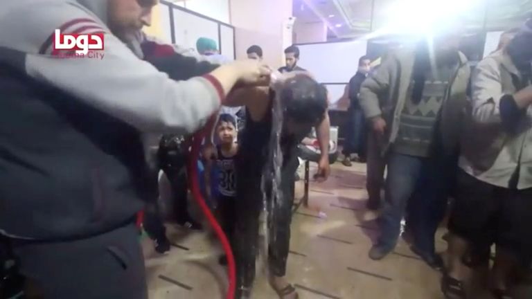 April 2018: A man is washed following the alleged chemical weapons attack