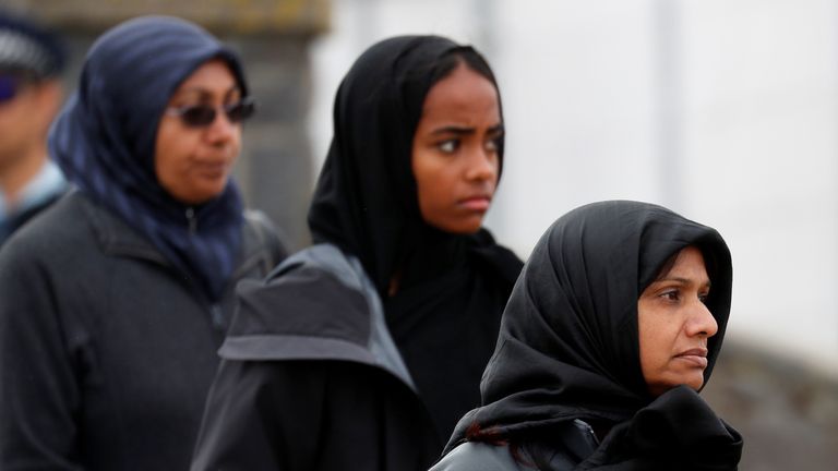 Mourners at the funeral of one of the mosque attack victims